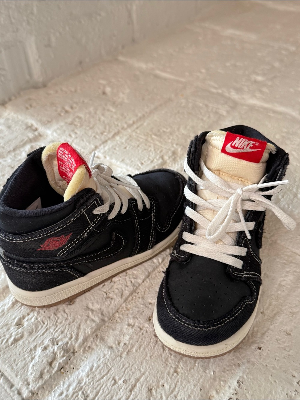 Jordan Kids Black and Cream High-Top Sneakers with Red Logo